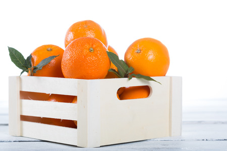 Box of fresh oranges harvested in Valencia Spainの写真素材