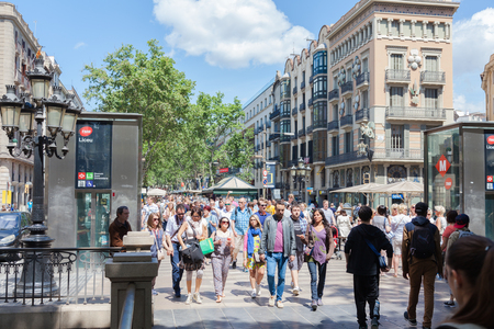 BARCELONA, SPAIN-MAY 13, 2016: Barcelona is the capital of the autonomous community of Catalonia in Spain city. Crowd of people visit the Rambla de Barcelona, Spain.のeditorial素材