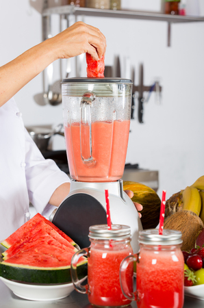 Chef preparing a refreshing watermelon shakeの写真素材