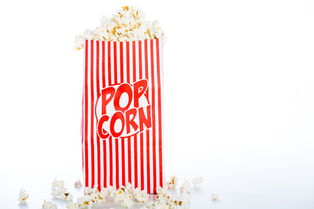 Large pot of popcorn on white backgroundの写真素材