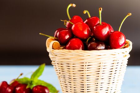 Basket of freshly picked cherries from the treeの写真素材
