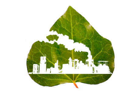 Silhouette of industrial factory on a green leaf