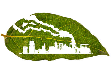 Silhouette of industrial factory on a green leafの写真素材
