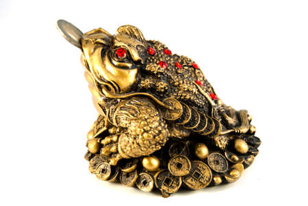 Feng Shui toad with a coin symbolizes the fact that the house where it was never run out of moneyの写真素材