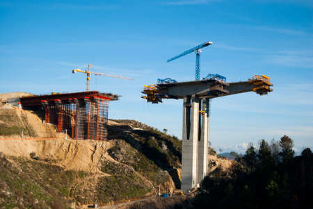 process of construction of the bridge to pass through it motorwaysの写真素材
