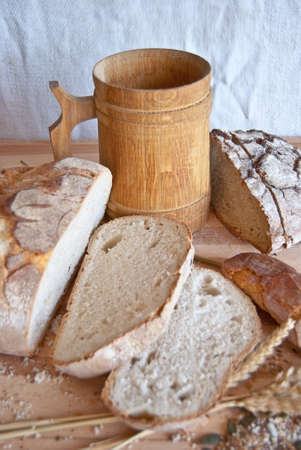 sliced bread on a wooden boardの写真素材