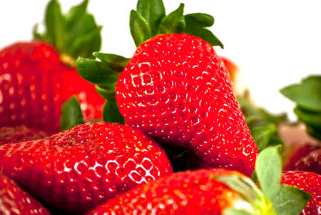 Ripe red strawberries in a box on a white backgroundの写真素材