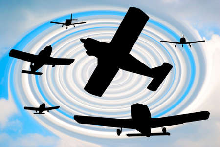 black silhouettes of aircraft on blue and white backgroundの写真素材