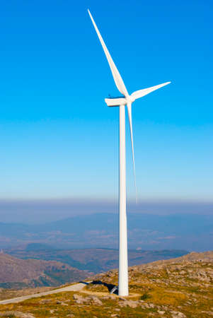Wind turbine (wind power plant) - a device for converting the kinetic energy of wind into electrical energy.の写真素材