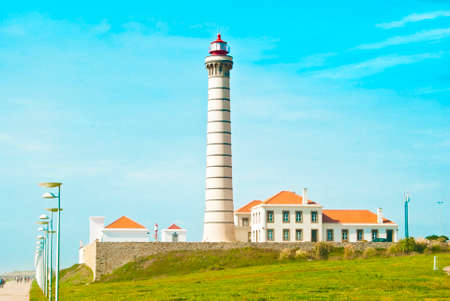 Lighthouse - a means of coastal navigation equipment in the form of large reservoirs of capital structure.の写真素材