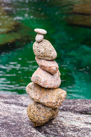 pyramid formation by laying stones at each other without any fastenersの写真素材