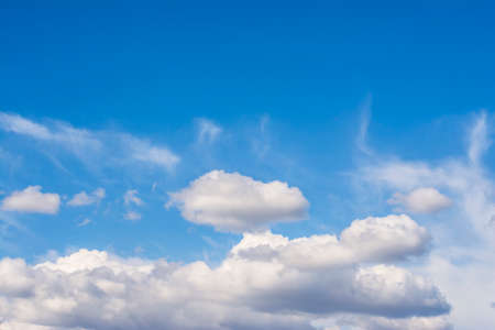 light white clouds against blue sky