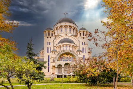Autumn image of the new cahtedral lighten by sunbeams in Deva town.のeditorial素材