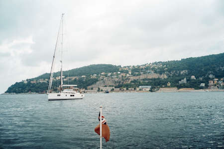 Monaco from the sea with white yachtの写真素材