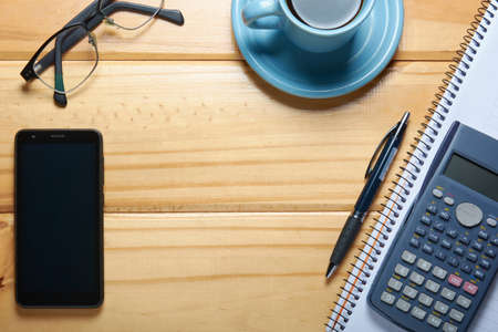 Top view of modern home office workspace with stationery