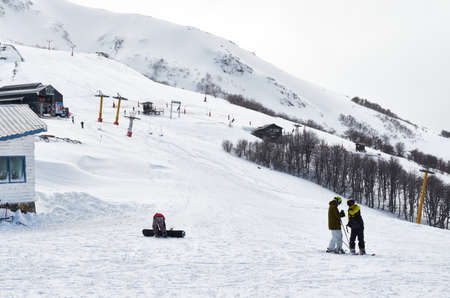 NEUQUEN, ARGENTINA - SEPTEMBER 8, 2015: People at the ski center of Cerro Bayo (Bayo Hill), touristic destination in Villa La Angostura, Neuquen, patagonia region of Argentina.のeditorial素材