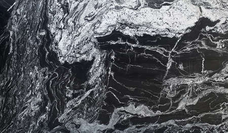 Black granite with pronounced white veins