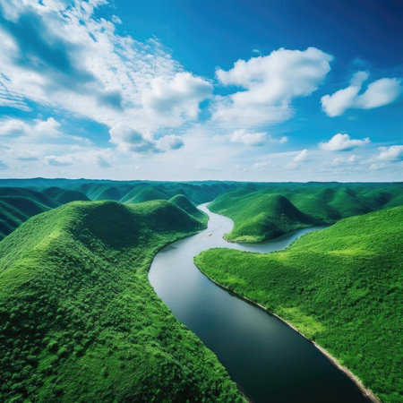 Beautiful landscape of green hills, river and blue sky with cloudsの素材