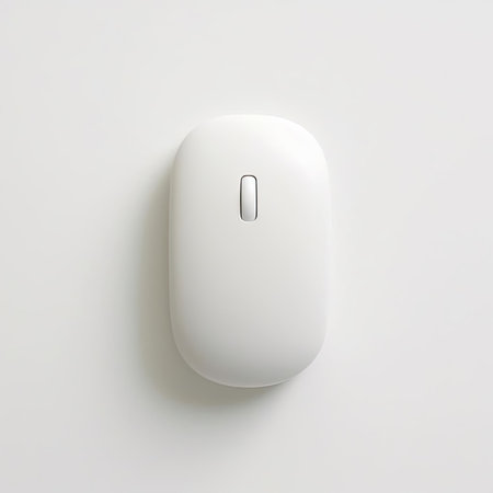 White computer mouse isolated on white background - top view - flat layの素材