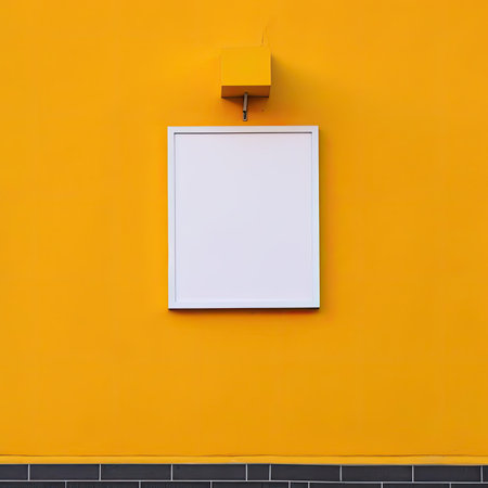 Blank white poster on yellow wall for your designの素材