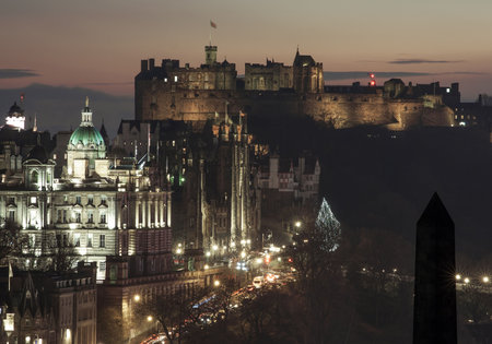 Edinburgh, Scotland. 11/18/18. View of Edinburgh's Castle at dusk from Calton Hill, with lights on...