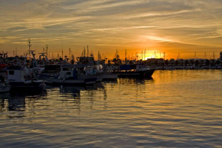 landscape with ships, maritime environment, of fishing, approaches the nightの写真素材