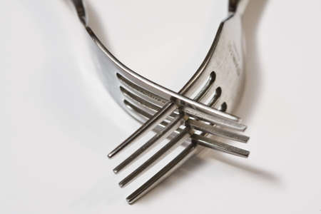 Two holders interlaced, isolated on white backgroundの写真素材