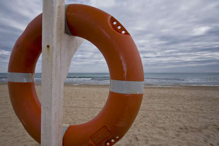 A lifeguard at a secluded beach in winter