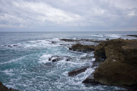 Pools among the rocks by the sea on a winter day 