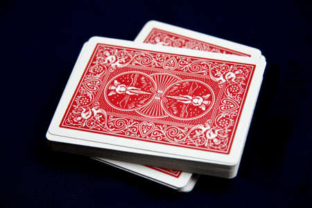 Displays various playing cards on a black backgroundのeditorial素材