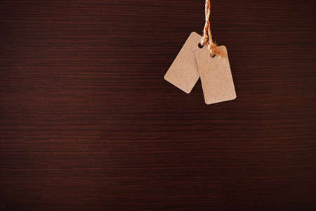 Tag on a dark background の写真素材