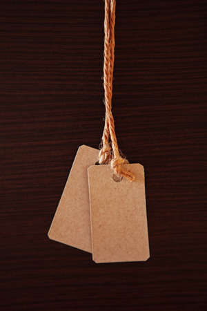 Tag on a dark background の写真素材