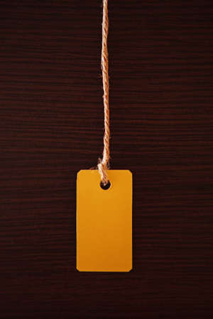 Tag on a dark background の写真素材