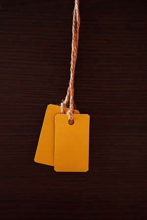 Tag on a dark background の写真素材