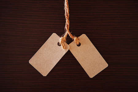 Tag on a dark background の写真素材