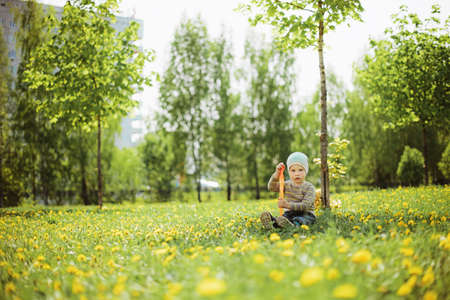 Baby sitting in the gardenの写真素材