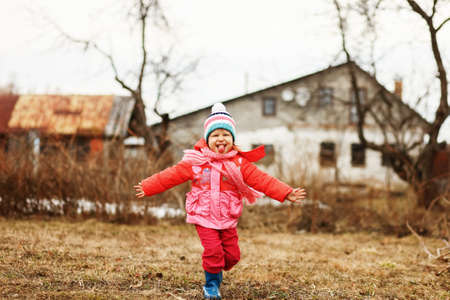 The Little children playing in the street.の写真素材