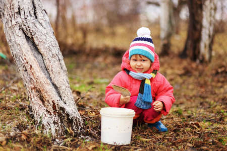 The child in garden happiness outdoors work.の写真素材