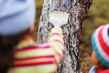 The child in garden happiness outdoors work.の写真素材