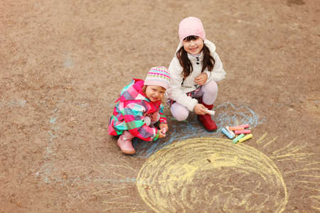 The chalk closeup a drawing to asphalt.の写真素材