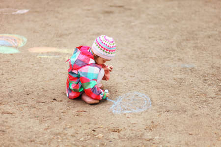The chalk closeup a drawing to asphalt.の写真素材