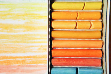 The colored dry postels close up background.の写真素材