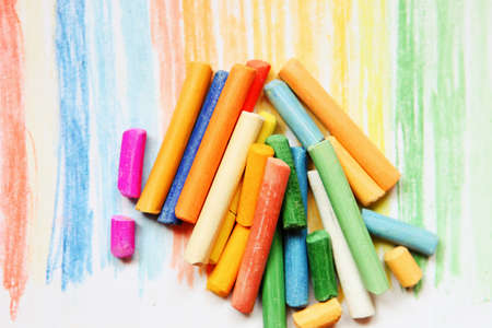 The colored dry postels close up background.