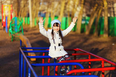 The Children happy outdoors play in playground.の写真素材