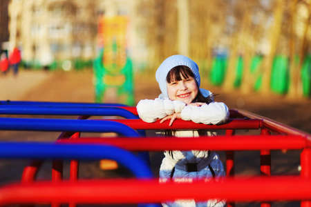 The Children happy outdoors play in playground.の写真素材