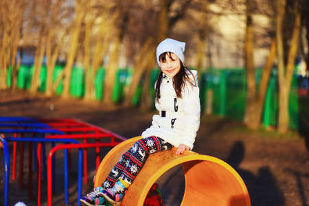 The Children happy outdoors play in playground.の写真素材