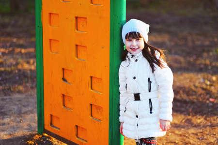 The Children happy outdoors play in playground.の写真素材