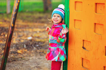The Children happy outdoors play in playground.の写真素材