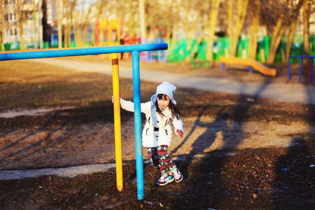 The Children happy outdoors play in playground.の写真素材
