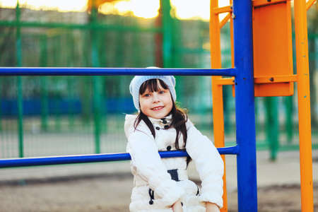 The Children happy outdoors play in playground.の写真素材